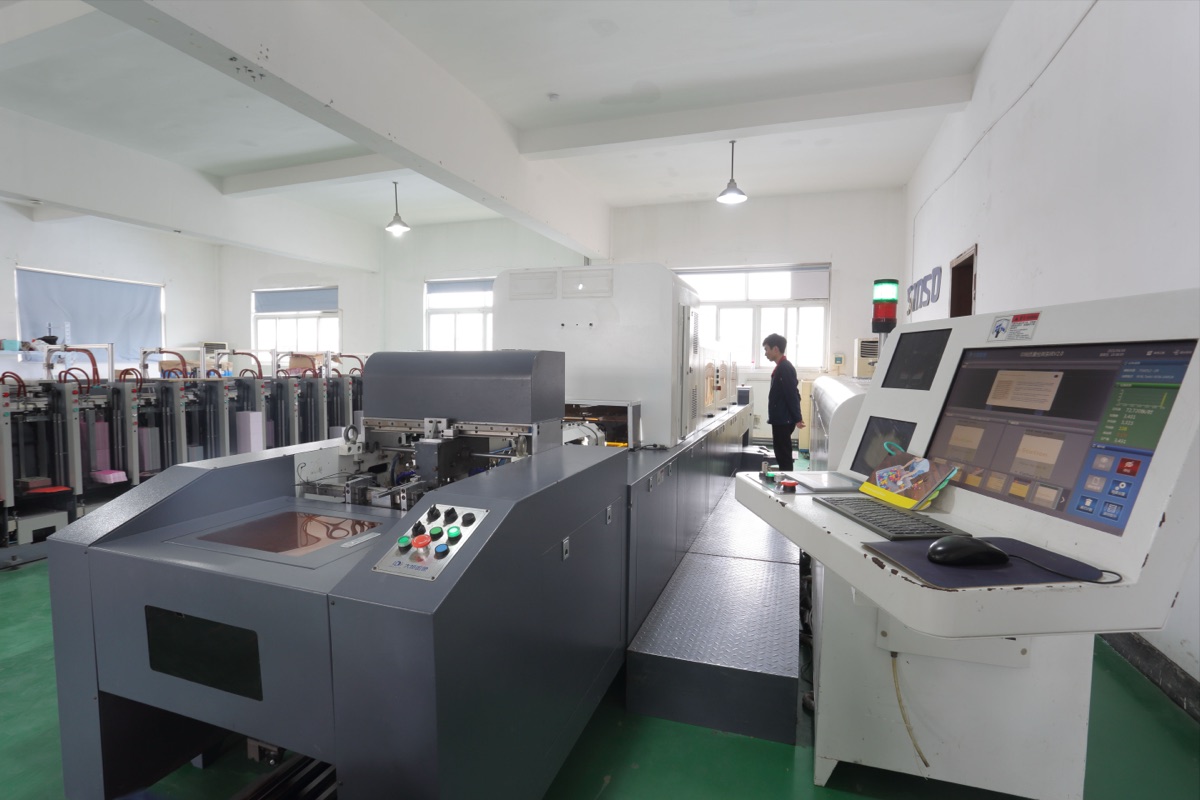 Automated sheet inspection machine for print quality control