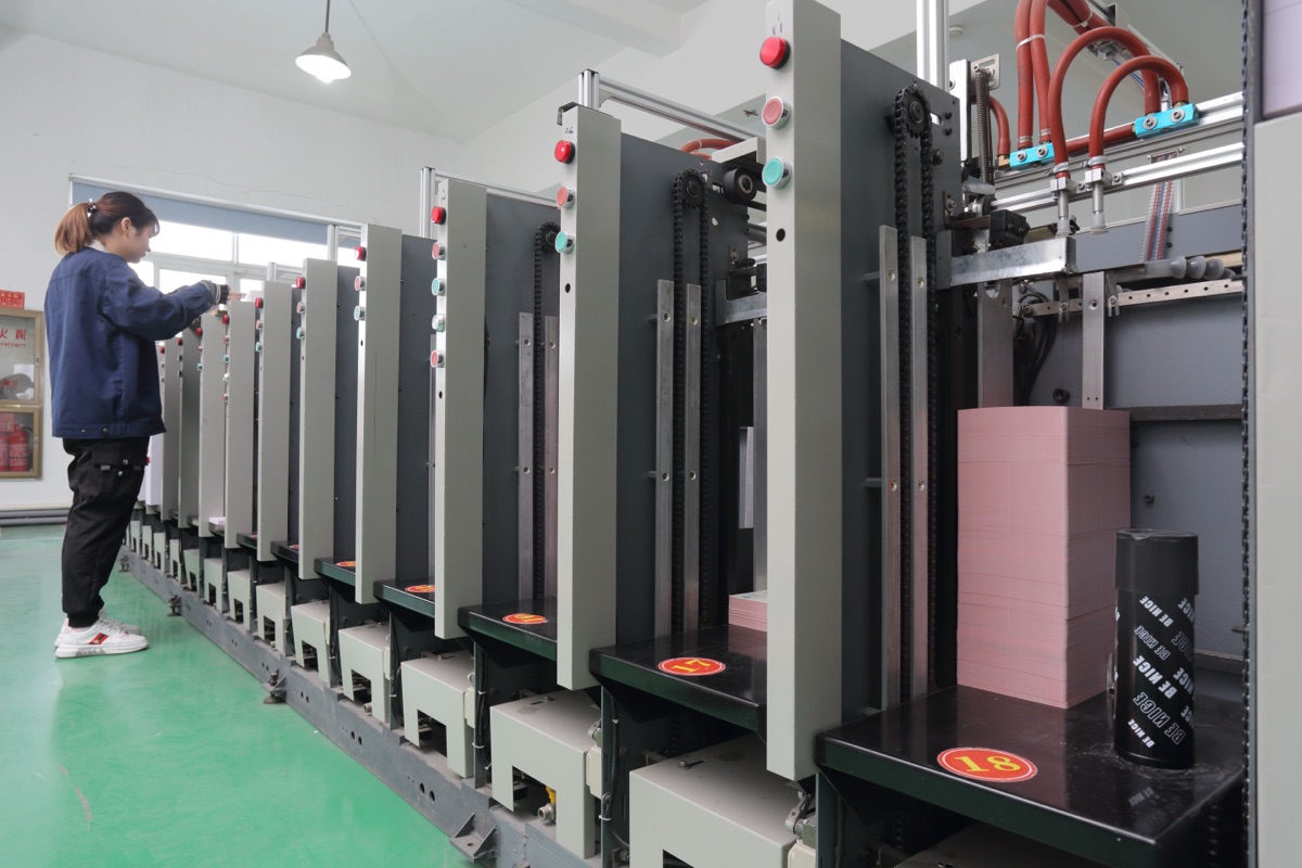 Collating machine for game card decks and multi-page booklets